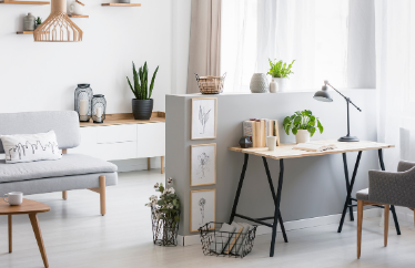 desk and living room area with a grey color scheme